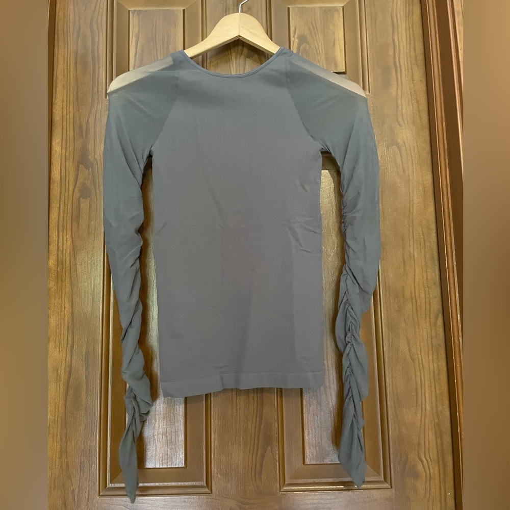 Free people intimately long sleeved top with sheer mesh sleeves